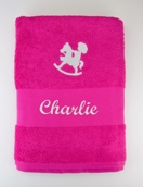 Serviette avec cheval à bascule