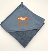 Cape de bain couleur avec motif en tissu appliqué