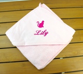 Cape de bain avec motif brodé Cape de bain avec motif brodé